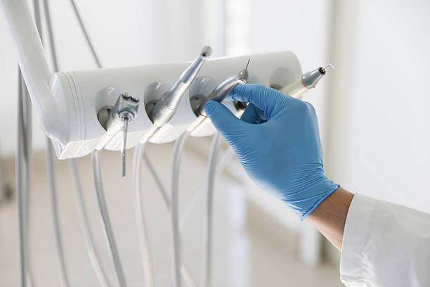 Professional Tooth Extraction technician working in Rockdale, TX